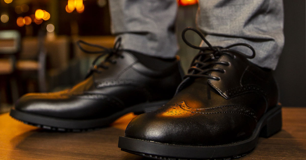 Worker chooses from among a range of comfy black work shoes