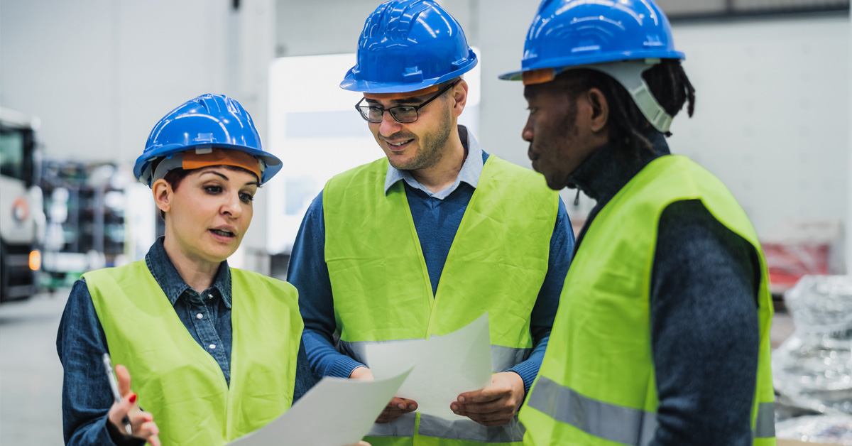 Engineers working in a robotics manufacturing plant